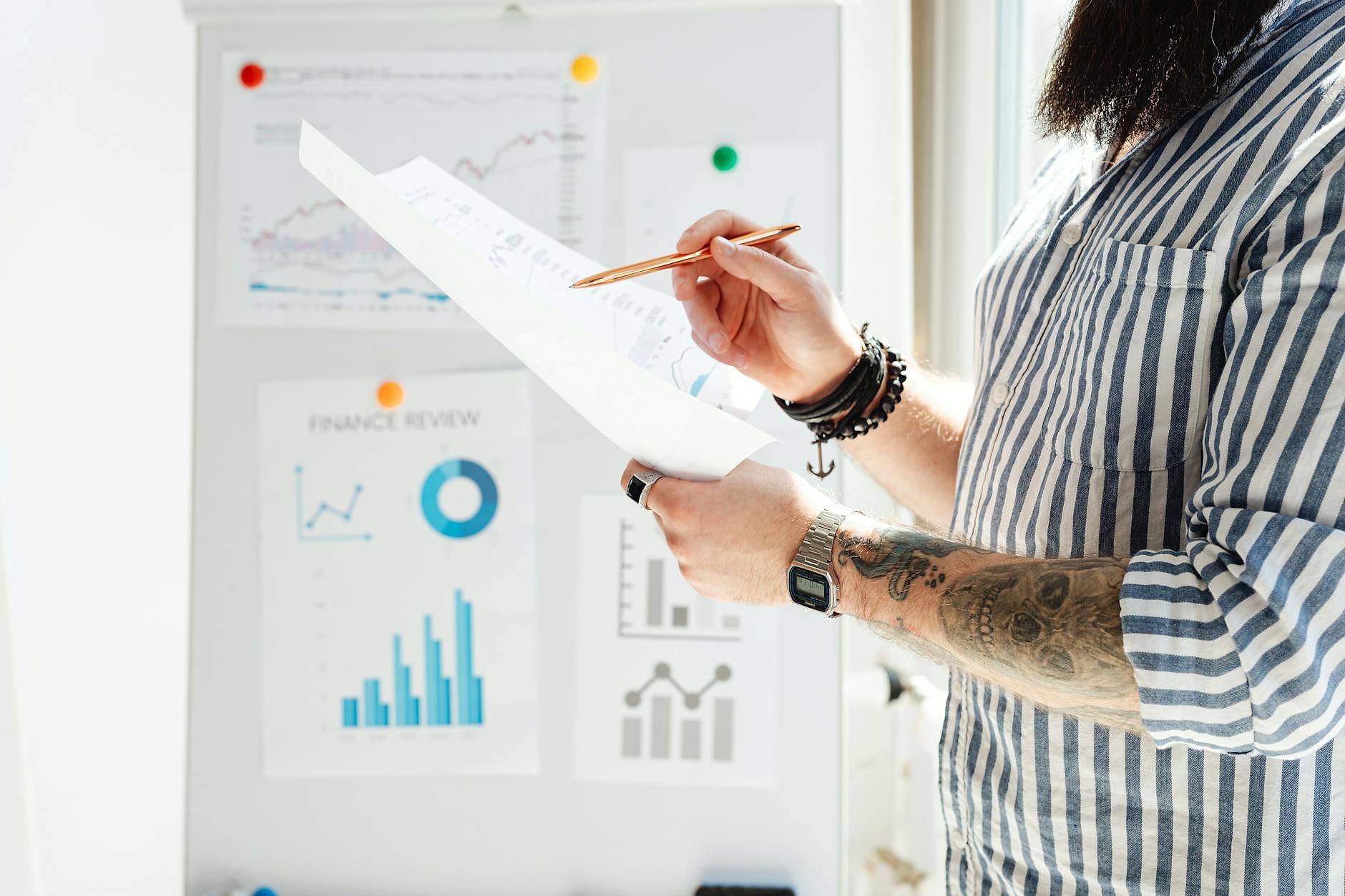 Finance professional reviewing system migration plan documents